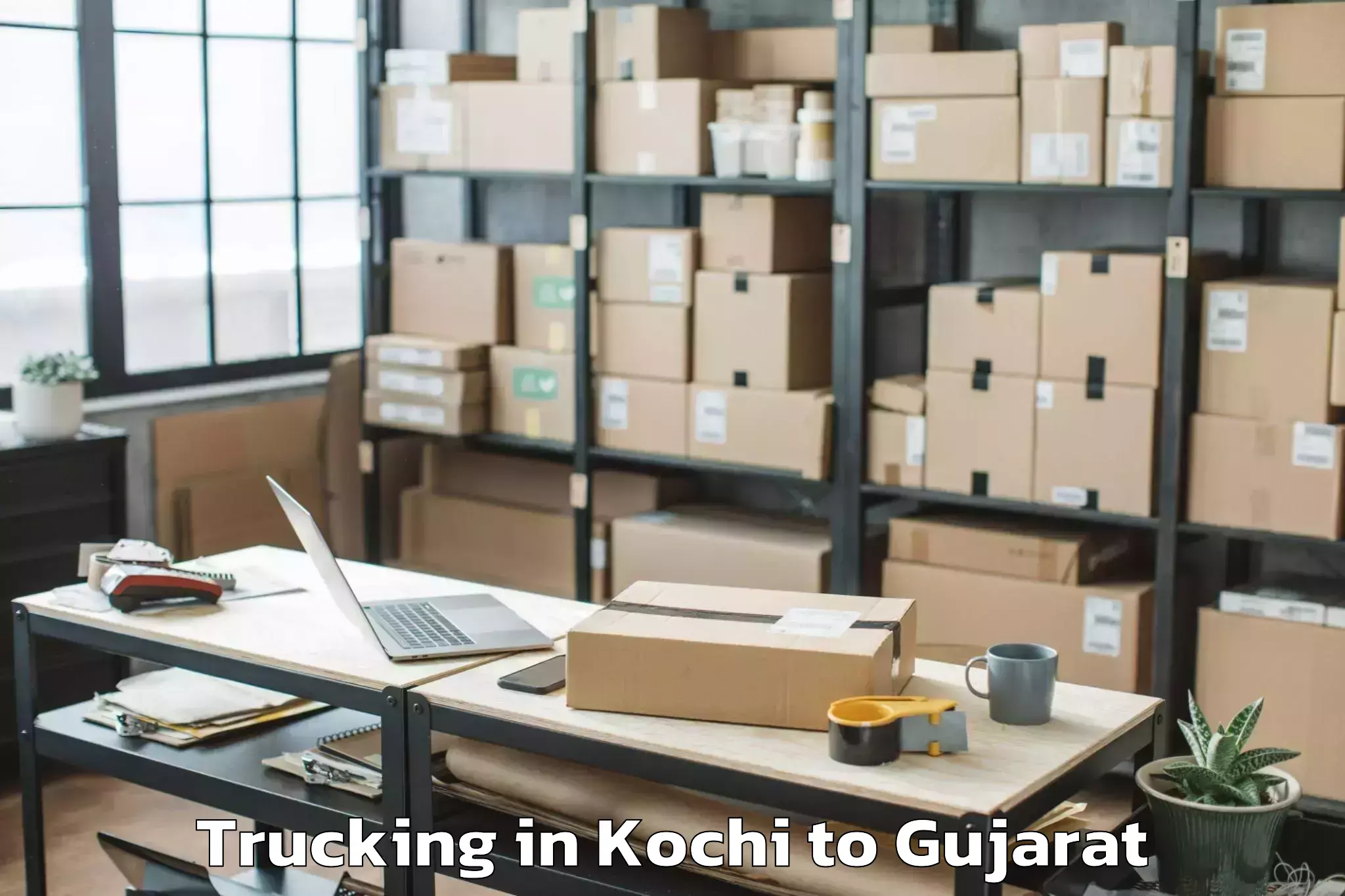 Discover Kochi to Veer Narmad South Gujarat Univ Trucking